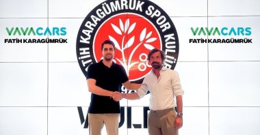 Italian football great Andrea Pirlo (R) shakes hands with a Fatih Karagümrük official after his appointment as the new coach of the club, Istanbul, Turkey, June 12, 2022. (IHA Photo)