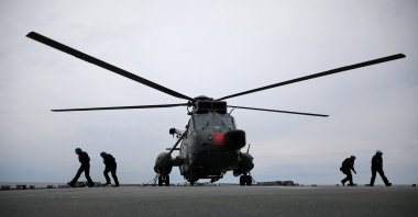 German Navy Frigate GS Sachen crew walk near a helicopter during the Baltops 22 exercise in the Baltic Sea, June 7, 2022. (Reuters Photo)