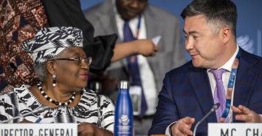 Director-General of the World Trade Organization Ngozi Okonjo-Iweala (L) and MC12 Chair Timur Suleimenov speak at the opening ceremony of the 12th Ministerial Conference at the headquarters of the World Trade Organization, Geneva, Switzerland, June 12, 2022. (EPA Photo)