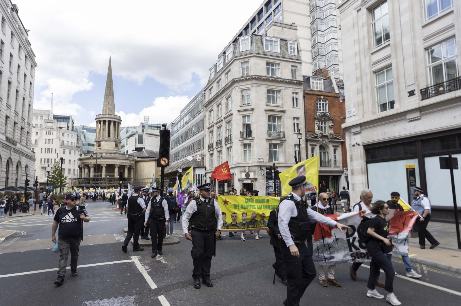 PKK terrorist sympathizers gathered in front of BBC headquarters earlier on Saturday and marched to Downing Street via central London, U.K., June 11, 2022. (AA)