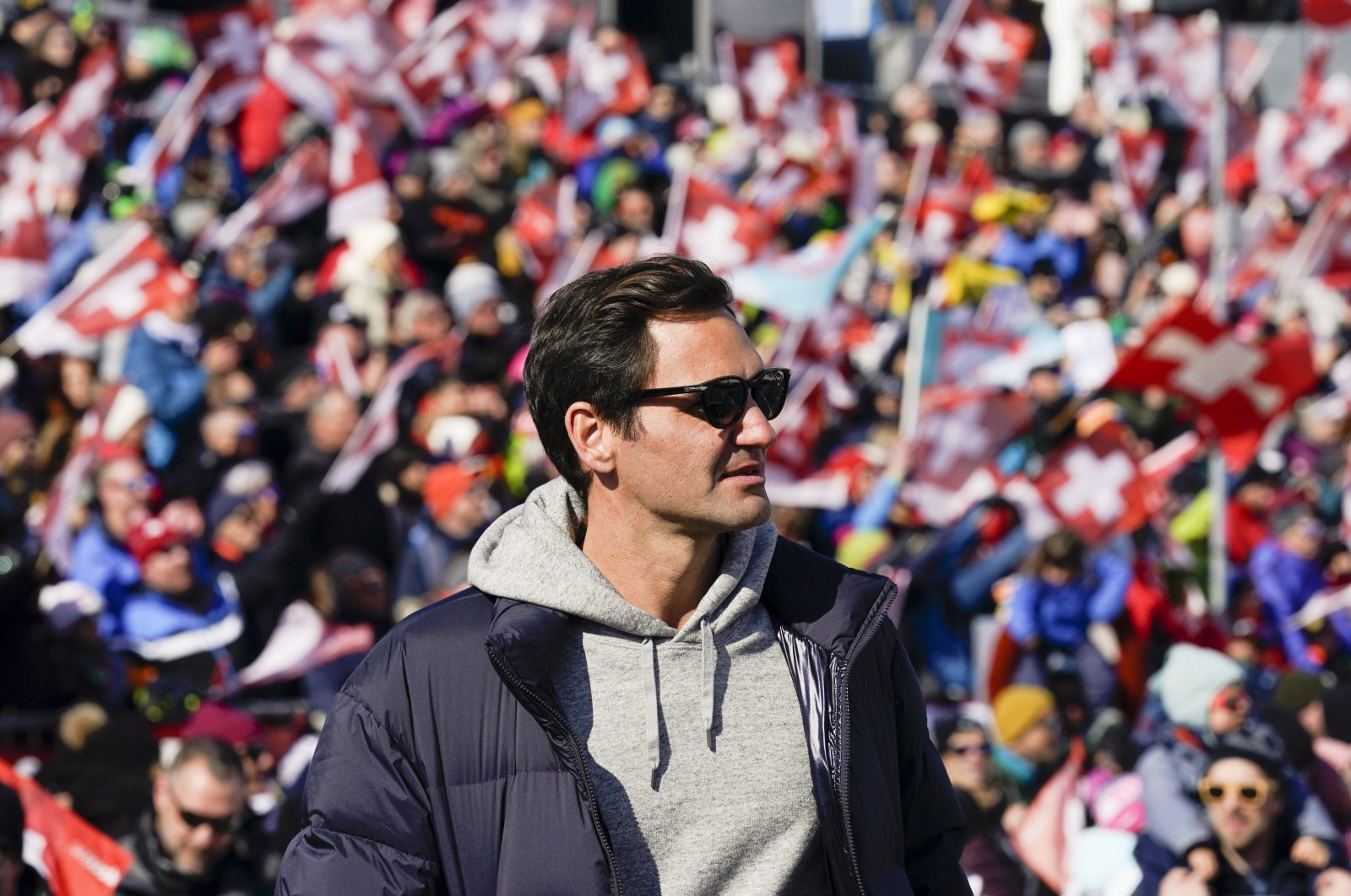 Swiss tennis star Roger Federer during a women&#039;s alpine ski event, Lenzerheide, Switzerland, March 6, 2022. (AP Photo)