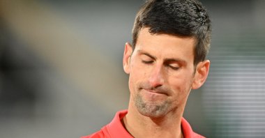 Novak Djokovic reacts after losing the French Open quarterfinal against Rafa Nadal, Paris, France, June 1, 2022. (AA Photo)