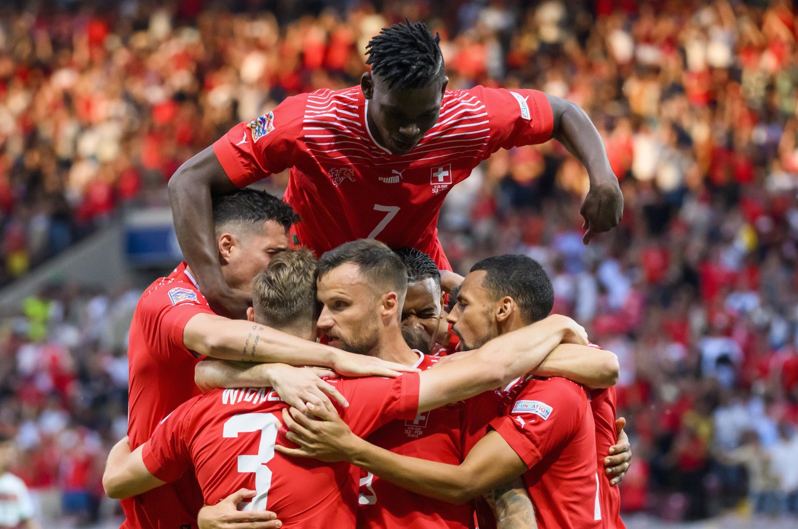 Switzerland players celebrate a goal in a UEFA Nations League match against Portugal, Geneva, Switzerland, June 12, 2022. (AP Photo)