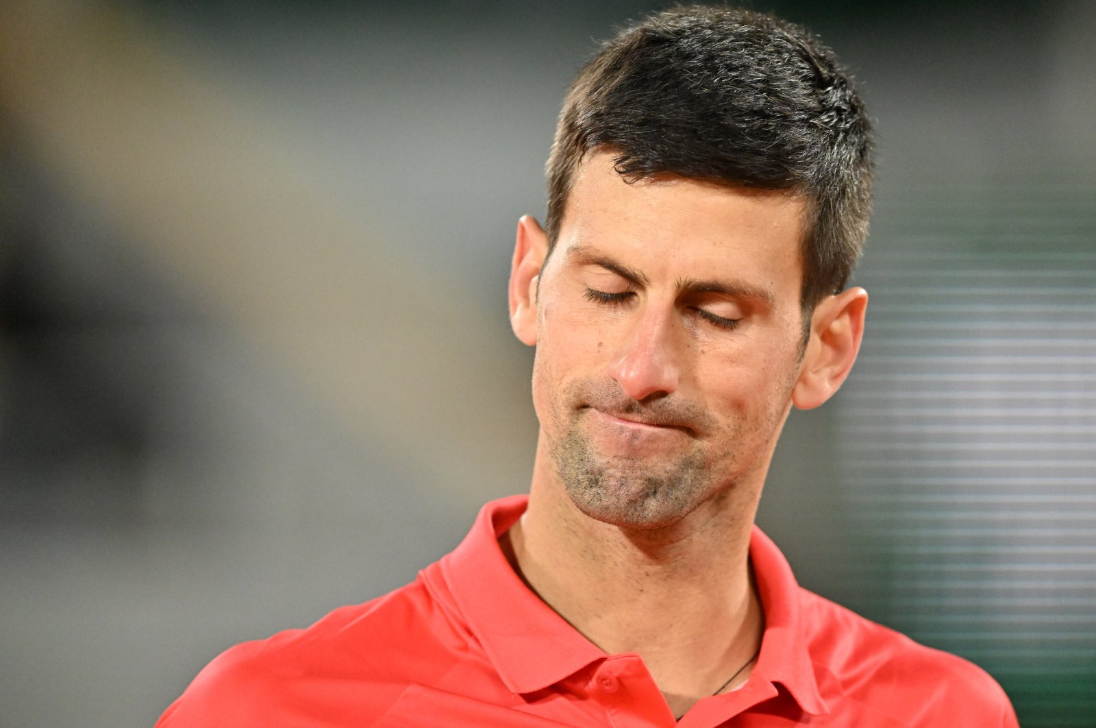 Novak Djokovic reacts after losing the French Open quarterfinal against Rafa Nadal, Paris, France, June 1, 2022. (AA Photo)