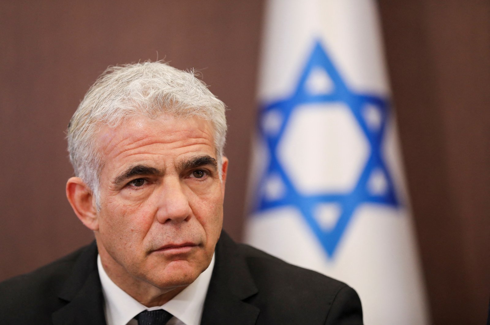 FILE PHOTO: Israeli Foreign Minister Yair Lapid attends a cabinet meeting at the Prime Minister's office in Jerusalem May 15, 2022. Abir Sultan/Pool via REUTERS/File Photo