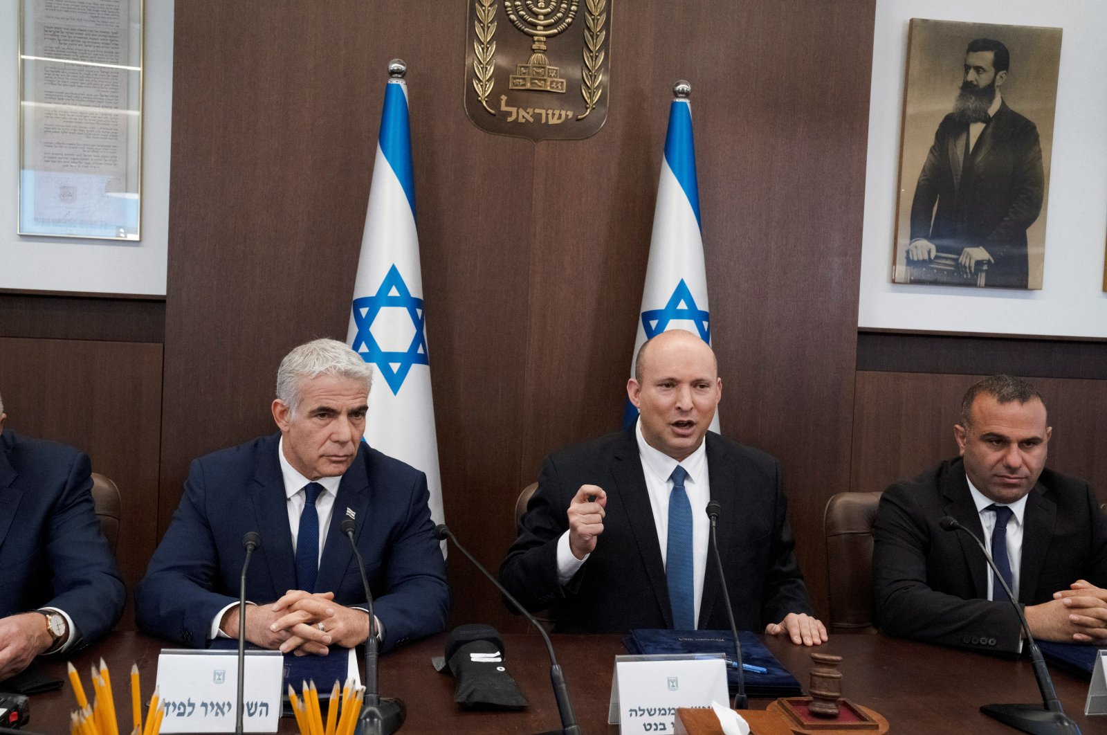 Israeli Prime Minister Naftali Bennett (C) chairs the weekly Cabinet meeting in Jerusalem, June 12, 2022. (Reuters Photo)