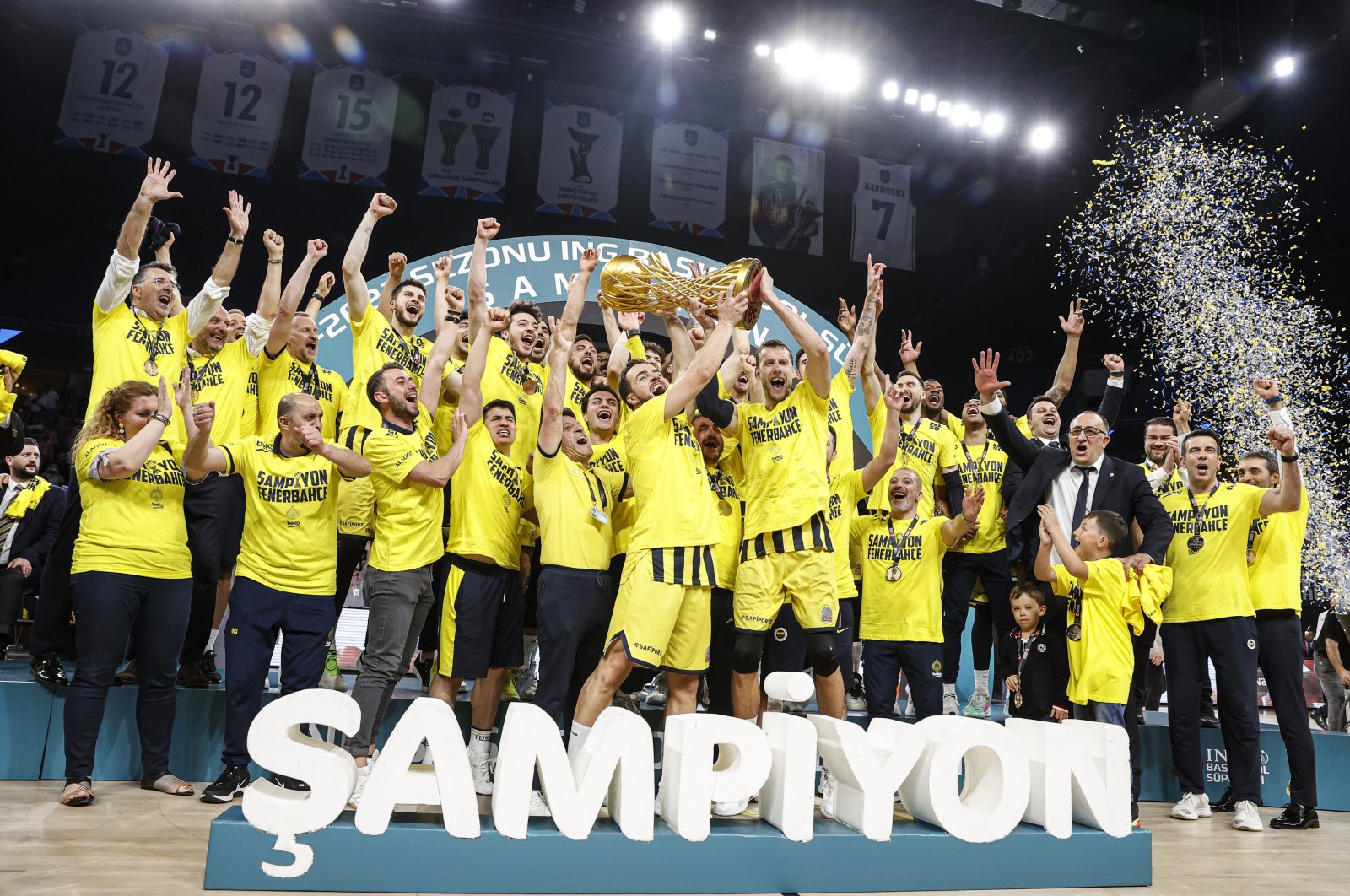 Fenerbahçe Beko players and staff celebrate after becoming 2021-22 ING Basketball Süper Lig champions after defeating Anadolu Efes, Istanbul, Turkey, June 13, 2022. (AA Photo)