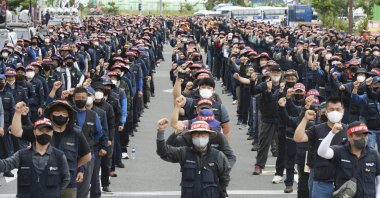 Members of the Cargo Truckers Solidarity stage a rally in Ulsan, South Korea, June 13, 2022. (AP Photo)