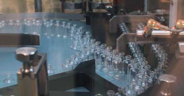 Medical vials are seen on a production line in this undated file photo. (Shutterstock Photo)