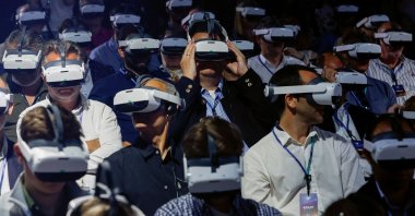 Members of the audience wear virtual reality headsets during a presentation at the CUPRA Impulse Event in Sitges, near Barcelona, Spain, June 7, 2022. (Reuters Photo)
