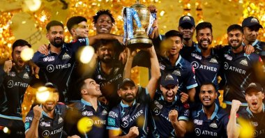 Gujarat Titans&#039; players celebrate with the IPL trophy, Ahmedabad, India, May 29, 2022. (BCCI/IPL Photo)
