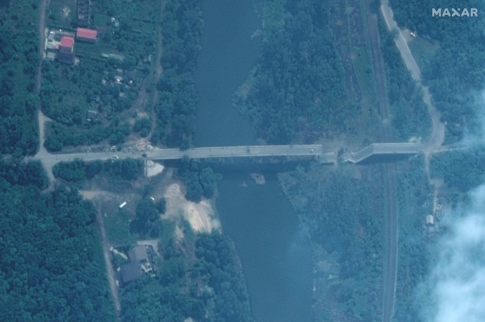 A satellite image shows the damaged Pavlograd Bridge in western Severodonetsk, Ukraine, June 11, 2022. (Maxar Technologies via Reuters)