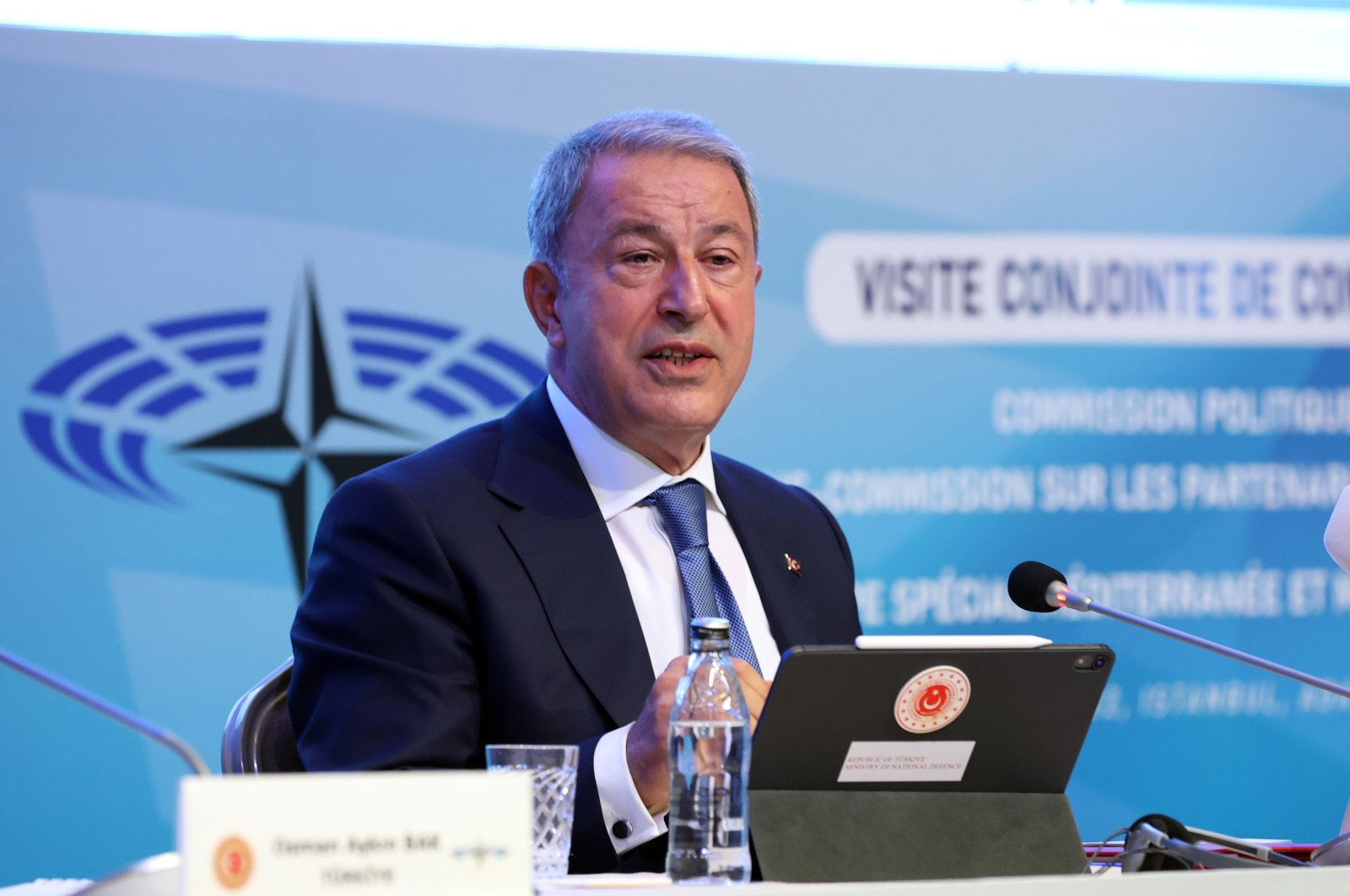 Defense Minister Hulusi Akar speaks at the NATO PA Political Committee meeting in Istanbul, Turkey, June 14, 2022. (AA Photo)