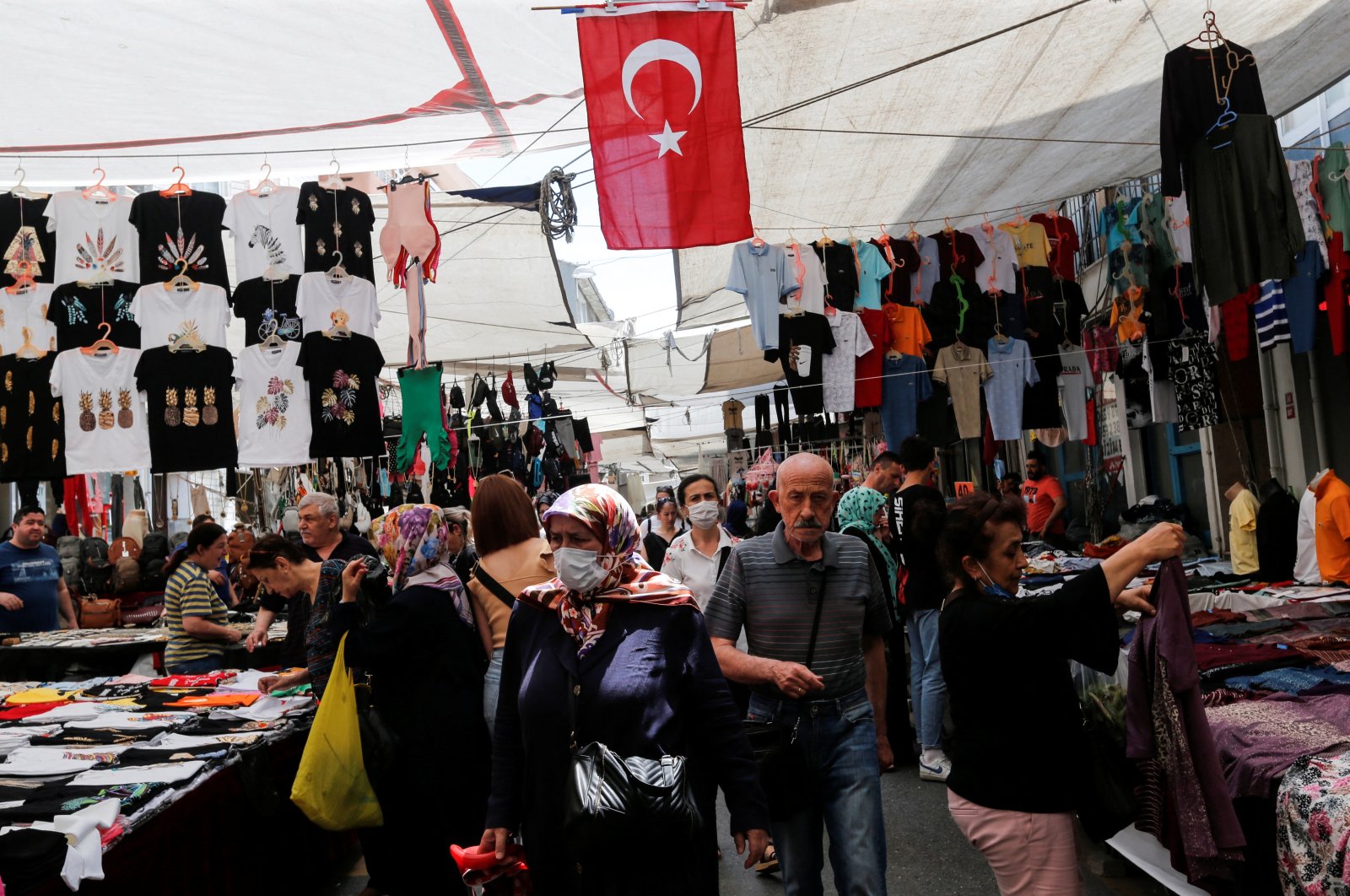 People shop at a market in Istanbul, Turkey, June 10, 2022. (Reuters Photo)