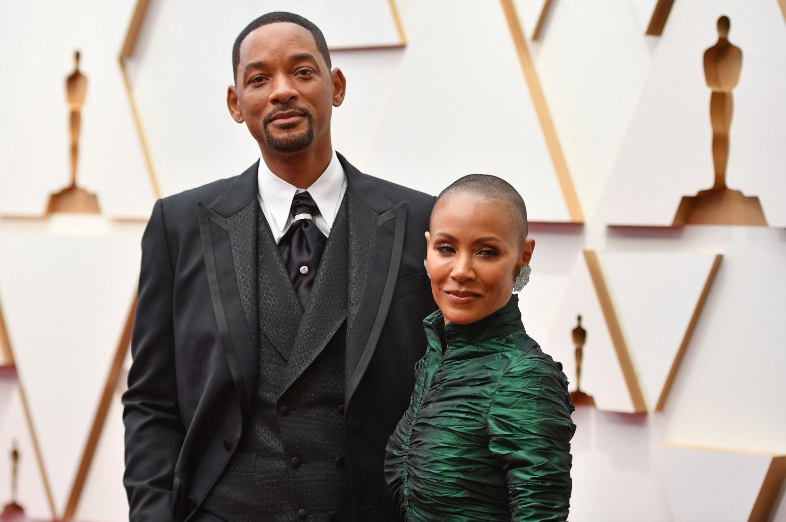 In this file photo taken on March 27, 2022, U.S. actor Will Smith and his wife actress Jada Pinkett Smith attend the 94th Oscars at the Dolby Theater in Hollywood, California, U.S. (AFP)