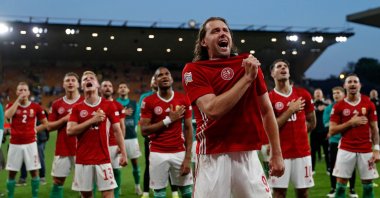 Hungary players celebrate a win over England in the UEFA Nations League, Wolverhampton, England, June 14, 2022. (AFP Photo)