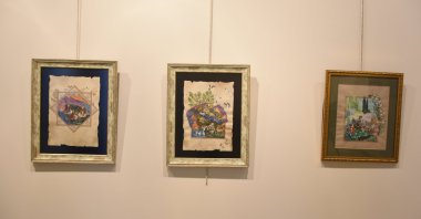 Some works on display at the &quot;MYSTERY – Arslantepe Mound Tile Designs and Miniature Exhibition,&quot; Malatya, eastern Turkey, June 14, 2022. (AA Photo)