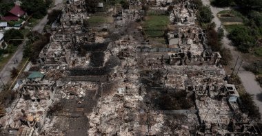 An aerial view shows destroyed houses after strikes in the town of Pryvillya at the eastern Donbass region, Ukraine, June 14, 2022. (AFP Photo)