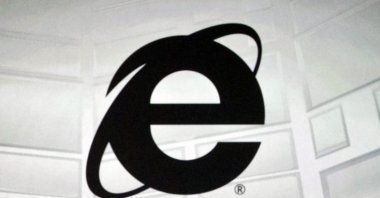 The Microsoft Internet Explorer logo is projected on a screen during a Microsoft Xbox E3 media briefing in Los Angeles, June 4, 2012. (AP Photo)