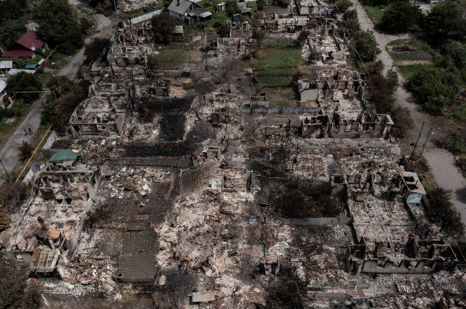 An aerial view shows destroyed houses after strikes in the town of Pryvillya at the eastern Donbass region, Ukraine, June 14, 2022. (AFP Photo)
