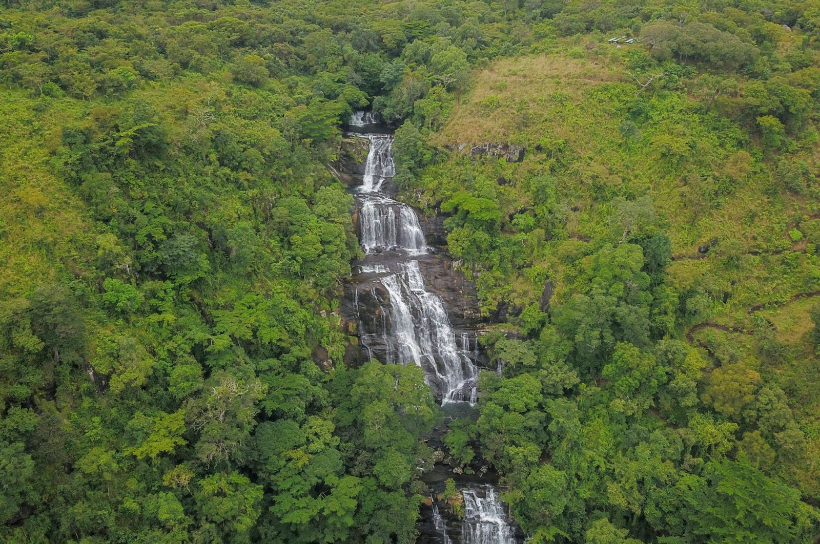 An aerial view shows the Murombodzi Falls at the Gorongosa mountain range in Gorongosa, Mozambique, May 20, 2022. (AFP Photo)
