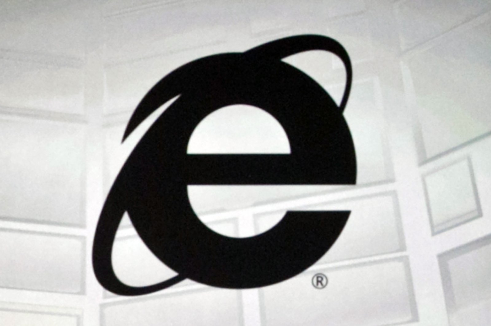 The Microsoft Internet Explorer logo is projected on a screen during a Microsoft Xbox E3 media briefing in Los Angeles, June 4, 2012. (AP Photo)