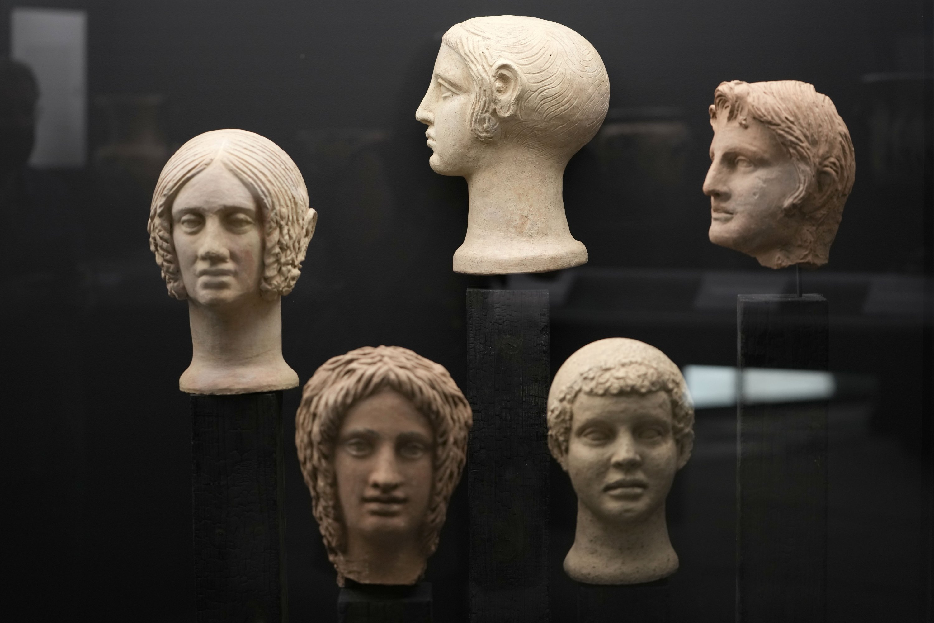 Votive terracotta heads and half-heads from the third and fourth centuries B.C. are displayed in the new "Museum of Rescued Art" in Rome, Italy, Wednesday, June 15, 2022. (AP)