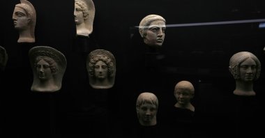Votive terracotta heads and half-heads from the third and fourth centuries B.C. are displayed in the new "Museum of Rescued Art" in Rome, Italy, Wednesday, June 15, 2022. (AP)