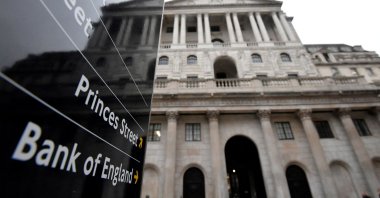 The Bank of England (BoE) building is reflected in a sign, London, Britain, Dec. 16, 2021. (Reuters Photo)