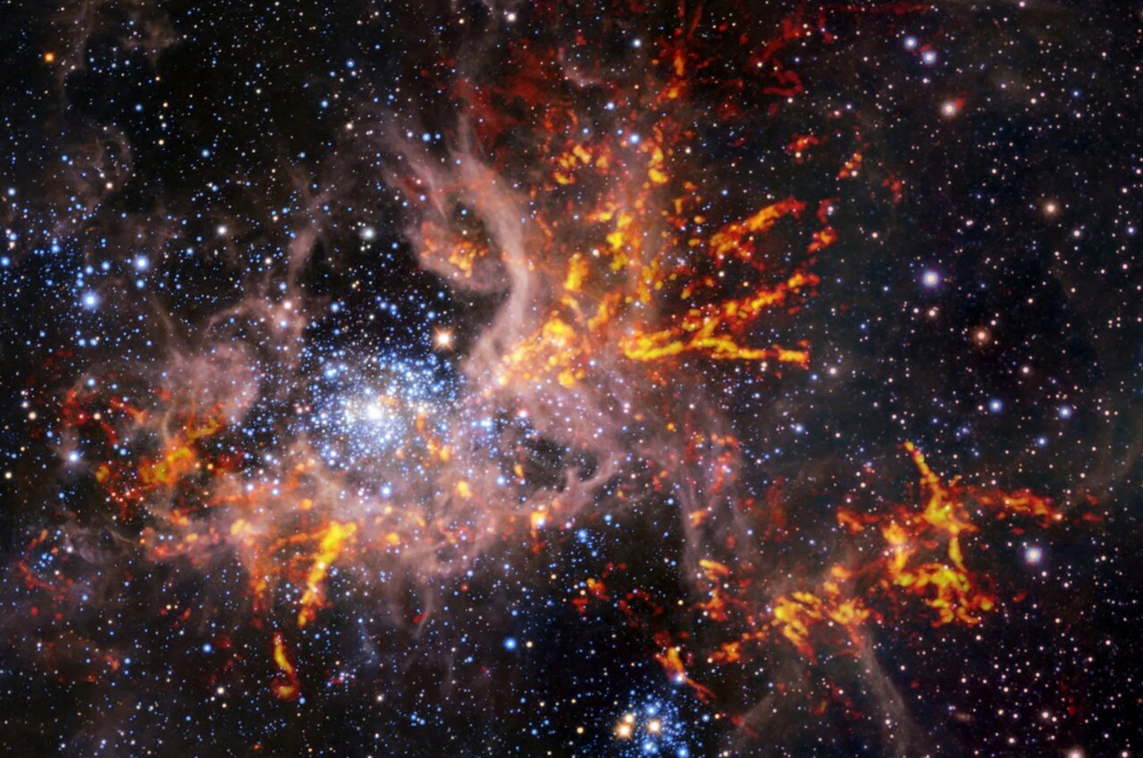A composite image shows the star-forming region called 30 Doradus, also known as the Tarantula Nebula. (Reuters Photo)