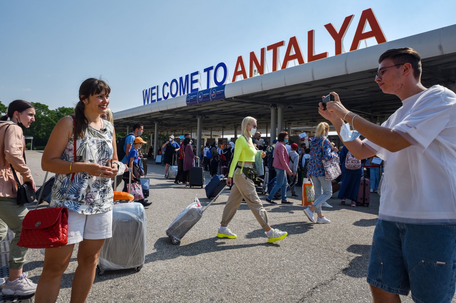 Tourists arrive at an airport in Antalya, one of the most popular tourist destinations in the Mediterranean, Turkey, June 22, 2021. (DHA Photo)