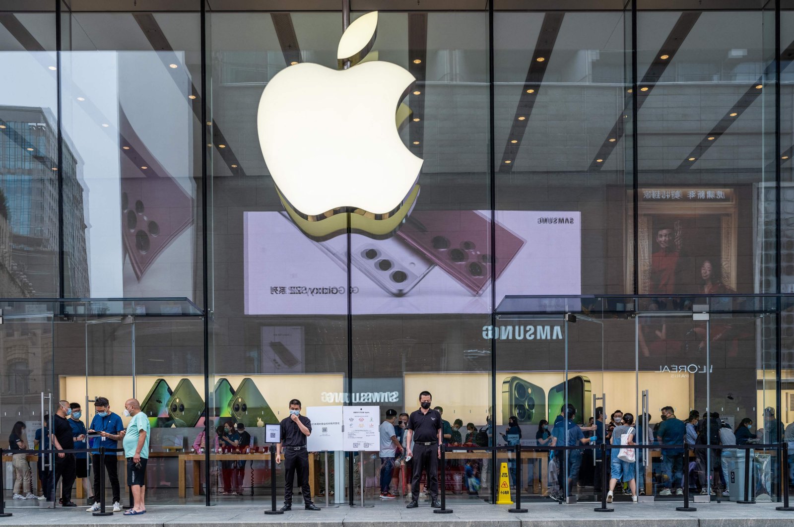 People visit an Apple Store in Shanghai, China, June 10, 2022. (AFP Photo)