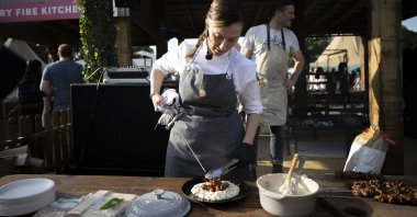 A chef prepares a traditional Turkish dish at the "Taste of London" food and beverage festival, in London, U.K., June 16, 2022. (AA Photo)