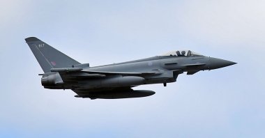 A Eurofighter Typhoon aircraft performs a fly-past during the Farnborough Airshow, southwest of London, Britain, July 17, 2018. (AFP Photo)
