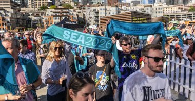 Soccer fans gather along the downtown Seattle waterfront to cheer the awarding of FIFA 2026 World Cup games in Seattle, the United States, June 16, 2022. (AP PHOTO)