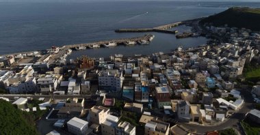This aerial photo shows the local fishing village of Neian in Xiyu Township on the Penghu islands, Taiwan, May 30, 2022. (AFP Photo)