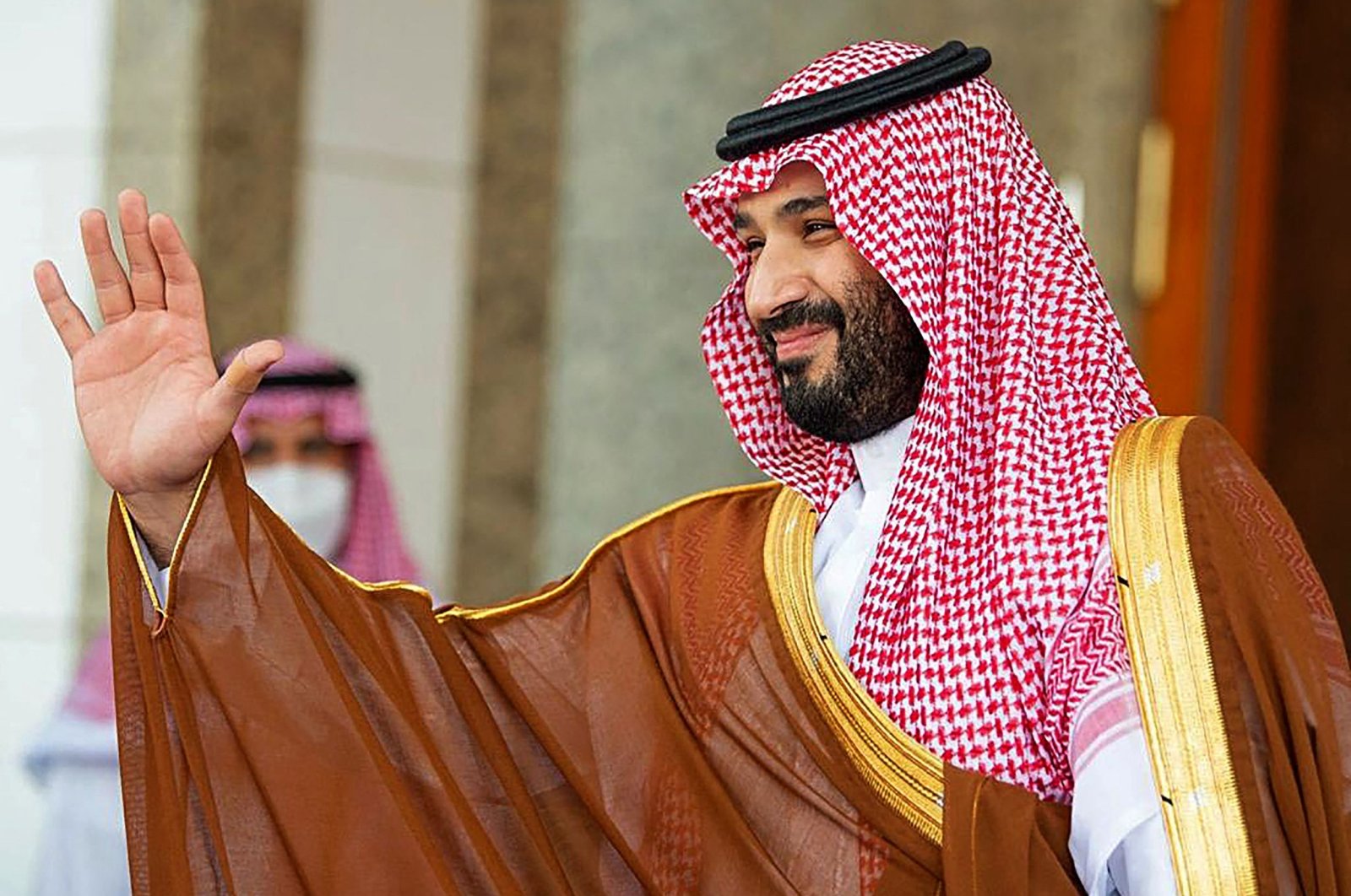 Saudi Crown Prince Mohammed bin Salman gestures as he receives the French president in the Red Sea coastal city of Jiddah, Saudi Arabia in this file handout photo provided by the Saudi Royal Palace on Dec. 4, 2021. (AFP Photo)