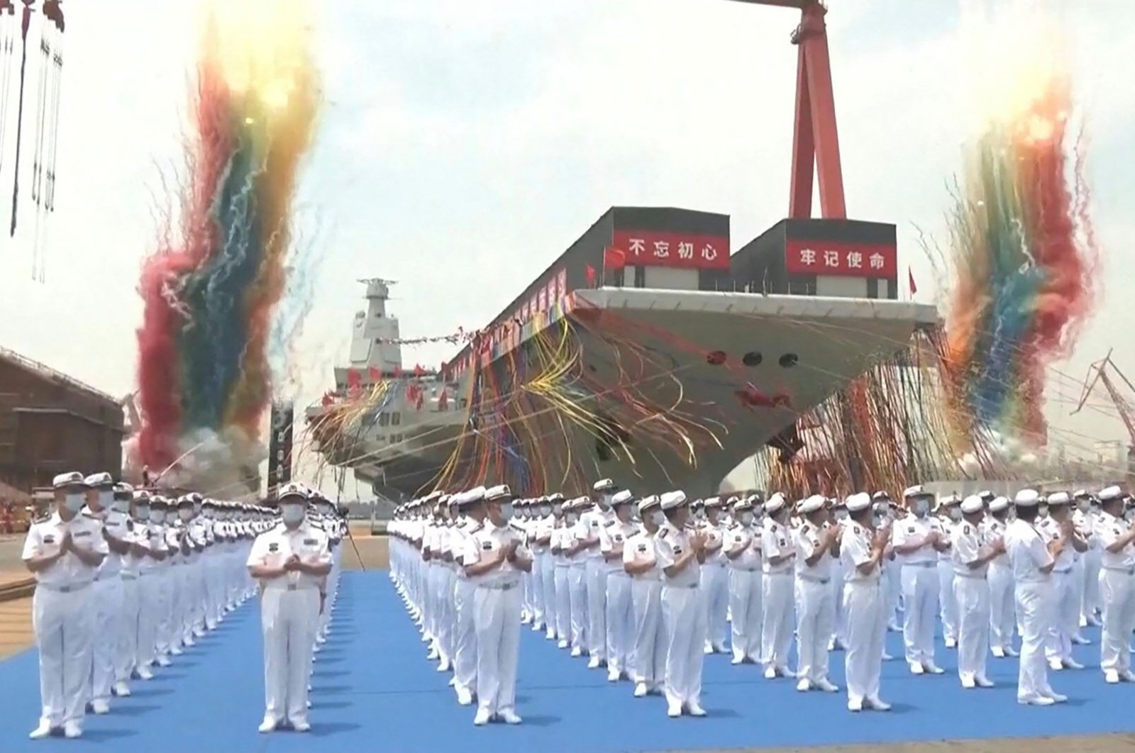 This screen grab made from a video released by Chinese state broadcaster CCTV shows the launch ceremony of the Fujian, a People&#039;s Liberation Army (PLA) aircraft carrier, Shanghai, China, June 17, 2022. (AFP photo via CCTV)