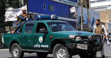 Taliban stand guard near the scene of explosions and a gunfight at a Sikh temple, Kabul, Afghanistan, June 18, 2022. (EPA Photo)