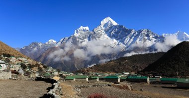 The Khumjung village is seen in the distance on the Everest base camp trek in the Solukhumbu district, Khumbu region, eastern Nepal, in this undated file photo. (Alamy Photo via Reuters)