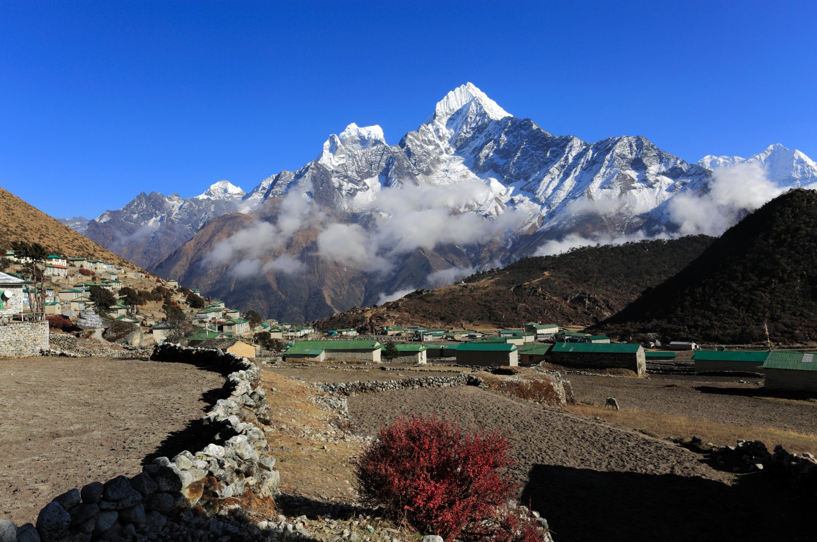The Khumjung village is seen in the distance on the Everest base camp trek in the Solukhumbu district, Khumbu region, eastern Nepal, in this undated file photo. (Alamy Photo via Reuters)