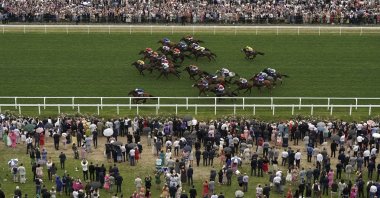 Naval Crown ridden by jockey James Doyle (bottom left) wins the Platinum Jubilee Stakes on the fifth day of the Royal Ascot horserace meeting, at Ascot Racecourse, in Ascot, England, June 18, 2022. (AP Photo)