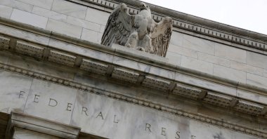 An eagle tops the U.S. Federal Reserve building's facade in Washington, D.C., U.S., July 31, 2013. (REUTERS File Photo)