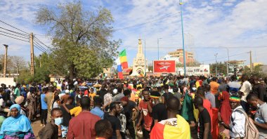 Thousands of people at a government-sponsored rally in Bamako, Mali, Jan. 14, 2021. (AP Photo)