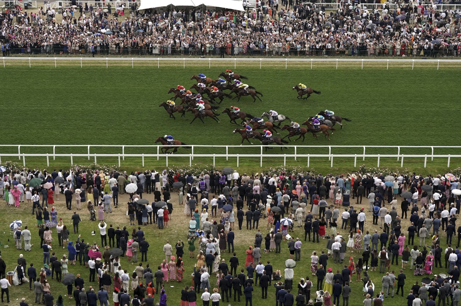 Naval Crown ridden by jockey James Doyle (bottom left) wins the Platinum Jubilee Stakes on the fifth day of the Royal Ascot horserace meeting, at Ascot Racecourse, in Ascot, England, June 18, 2022. (AP Photo)