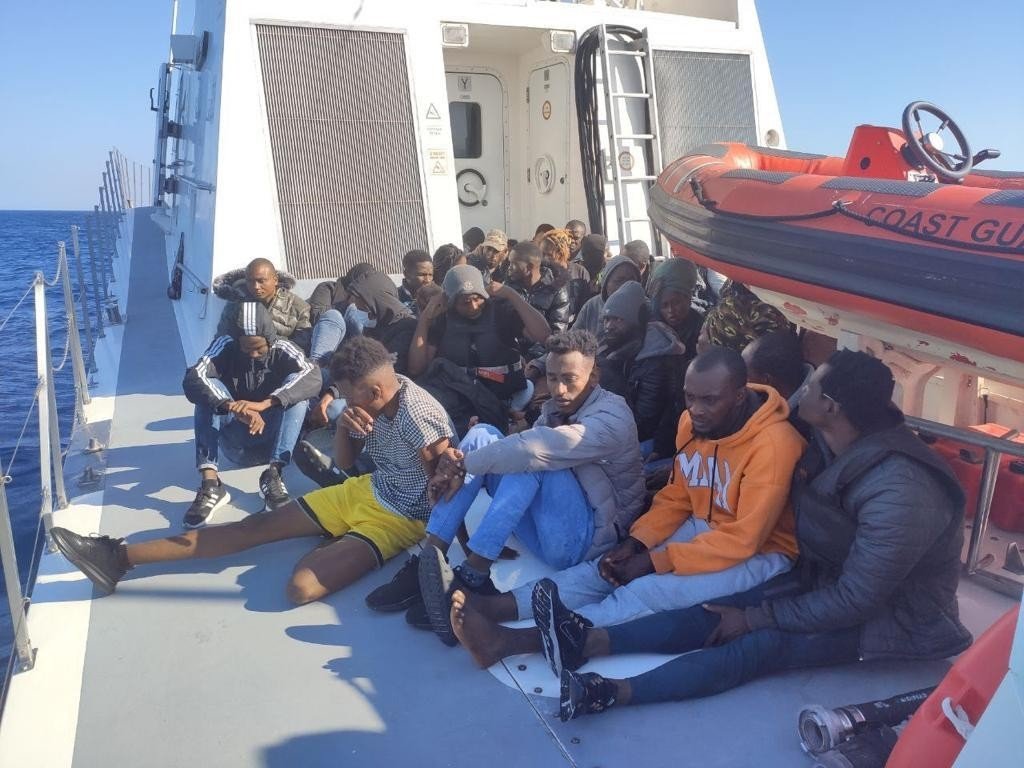 A group of irregular migrants pushed back by Greece on the Aegean Sea is rescued by the Turkish Coast Guard Command, Izmir, Western Turkey, June 17, 2022. (IHA Photo)