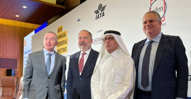 Wille Walsh, H.E Akbar Al Baker, Robin Hayes and Mehmet Tevfik Nane pose for a photograph after the opening press briefing at 78th global airline industry body IATA's annual meeting in Doha, Qatar June 20, 2022. (Reuters Photo)