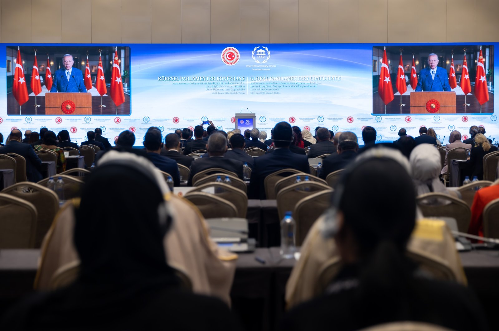 President Recep Tayyip Erdoğan addresses the Global Parliamentary Conference on migration via a video message, Istanbul, Turkey, June 20, 2022. (AA Photo)