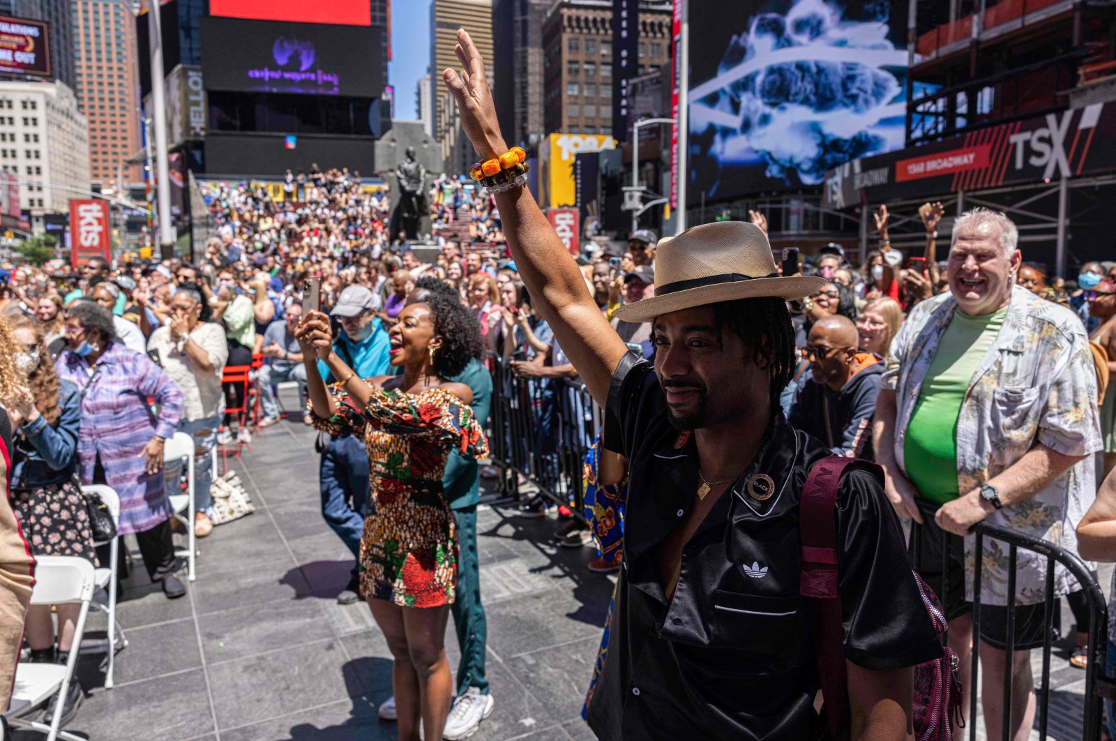 An onlooker reacts to a performance during a Juneteenth celebration in Times Square, in the Manhattan borough of New York, U.S., June 19, 2022. (AFP Photo)