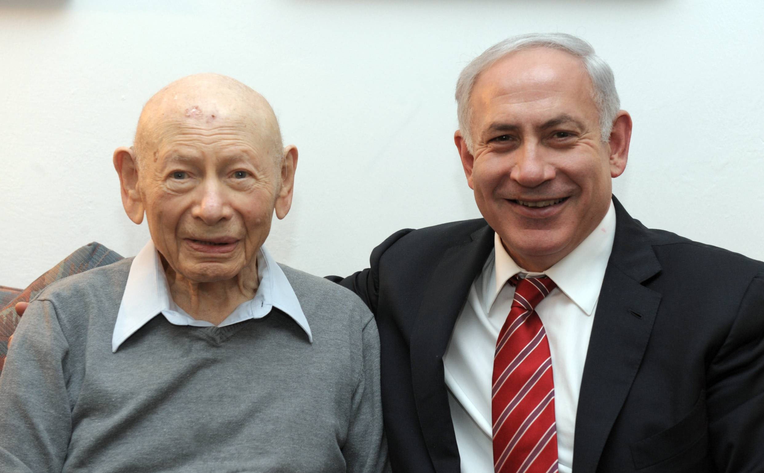 In this handout photo released by the Israeli Government Press Office (GPO),  Israeli Prime Minister Benjamin Netanyahu (R) sits with his father Professor Benzion Netanyahu on March 25, 2012 in an unspecified location. (Getty Images) 